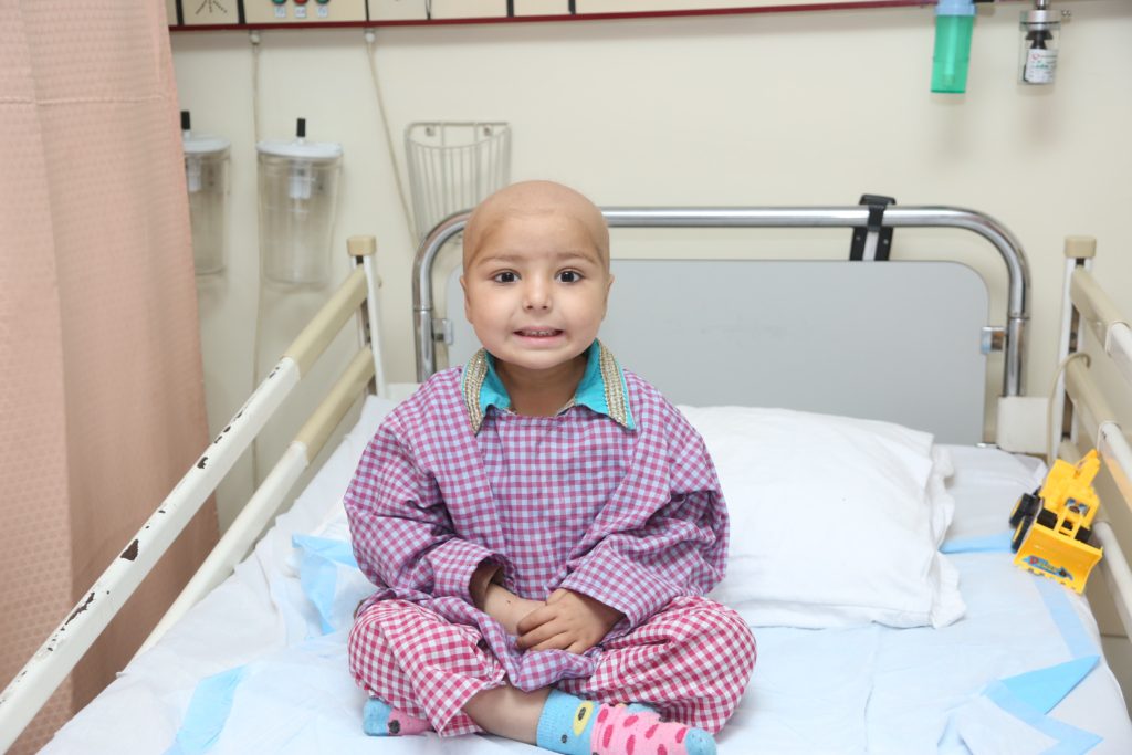 Young cancer patient receiving hospital care